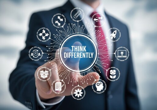 Businessman interacting with a digital network of icons and the phrase think differently