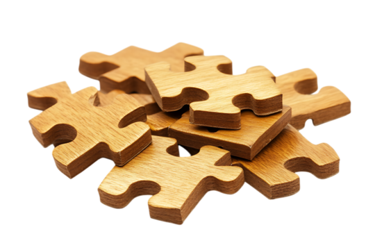 Pile of interlocking wooden jigsaw puzzle pieces scattered isolated on white or transparent png setting showcasing the texture and design, perfect for concepts related to problem solving