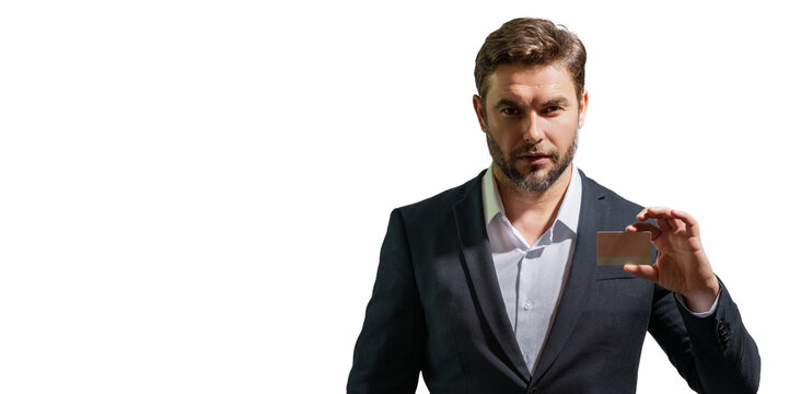 Man with a credit card to review statements. Credit cards purchases online. A man with a credit card with credit history making payments. Credit card offers. Banner for header, copy space.