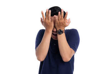Stressed Asian man covering face with hands showing frustration and anxiety expression isolated on...