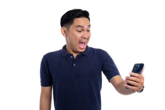 Surprised man looking at smartphone with shocked facial expression isolated on transparent background