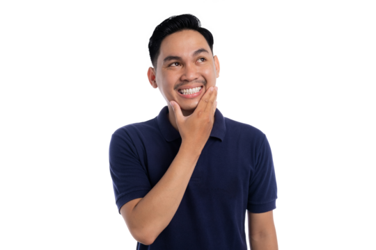 Smiling man touching his face with thoughtful and curious expression isolated on transparent background