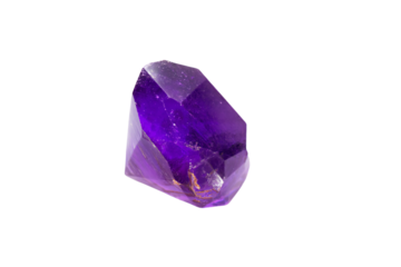a purple crystal on a white surface