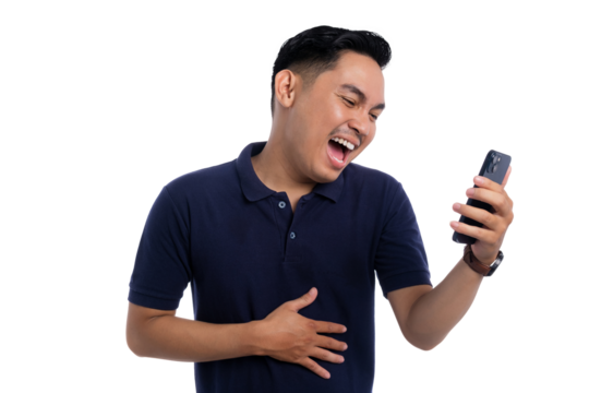 Cheerful young man laughing out loud while looking at smartphone wearing navy blue polo shirt isolated on transparent background