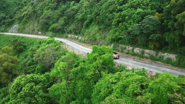 Exploring the scenic guangzhou yangjiang coastal highway with lush greenery and winding roads