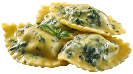 A group of four cooked ravioli, generously covered in a green, creamy spinach sauce and garnished with a fresh basil leaf, isolated on a white background.