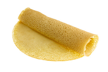 a crepe is sitting on a plate with a fork