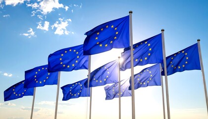European Union flags waving in a bright sky (1)