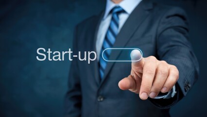 Businessman pressing a virtual start-up button on a futuristic interface, initiating a new venture.