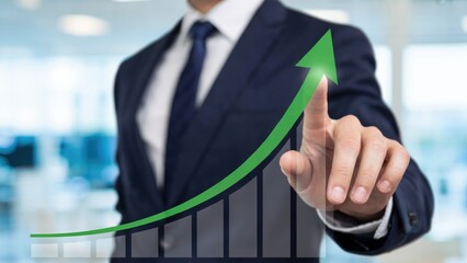 Businessman points to upward trending financial growth graph indicating success and progress