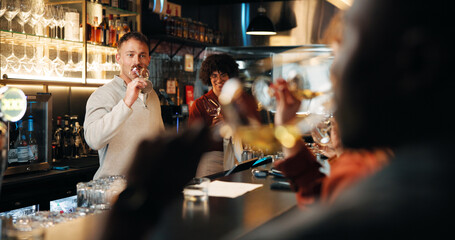 Barman, wine tasting and service with glass at restaurant for vintage, flavor profile and test. Person, bartender and guide with alcohol, drinks and social event at bar with customer experience