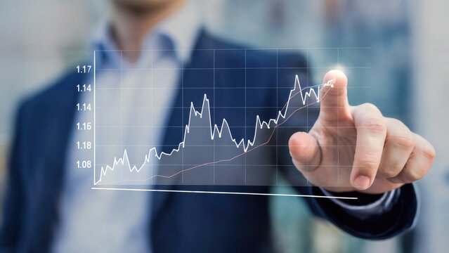 Businessman analyzing financial data on a digital graph