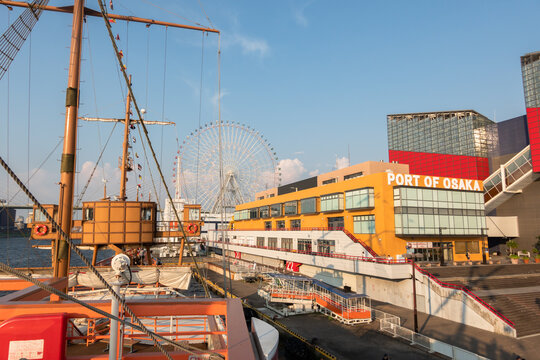 Osaka, Japan &ndash; July 12, 2025: View of Port of Osaka and ferris wheel from Santa Maria cruise ship docked at the pier.
