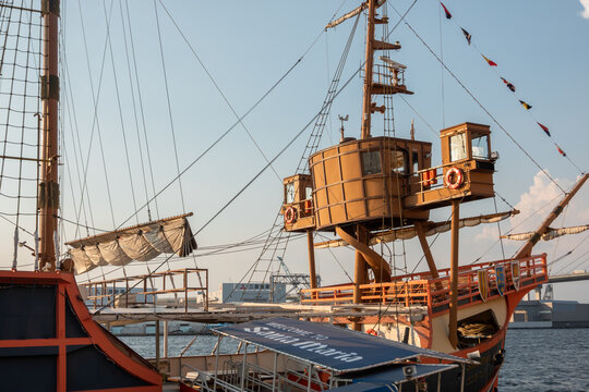 Osaka, Japan &ndash; July 12, 2025: Santa Maria sightseeing cruise ship docked at harbor during golden hour.