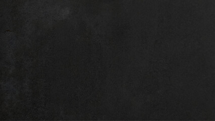 Textured grunge dark black concrete wall background. copy space for add text.