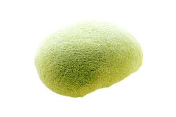 a green fruit with a white background