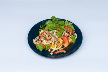 Fried egg salad with minced pork, vegetables, tomatoes