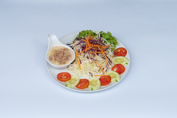 Tuna salad with mayonnaise, cabbage, tomato