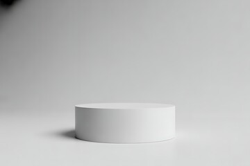 Minimalist White Cylinder Display Platform on Light Gray Background