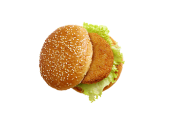 a hamburger with lettuce and a sesame seed bun