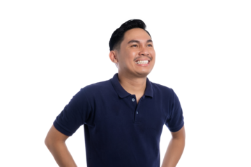 Smiling Asian man standing with hands on hips and looking up with hopeful and confident expression isolated on transparent background