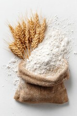 Wheat flour in a burlap sack with wheat sprigs