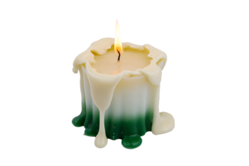 a candle with a green and white candle holder