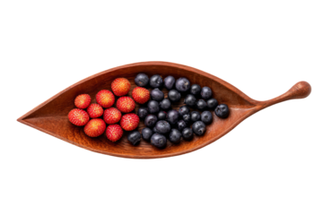 a wooden spoon filled with blueberries and strawberries