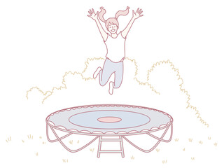 A joyful child with their arms raised high happily jumps with enthusiasm on a colorful trampoline outdoors in nature