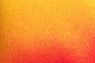 赤色と黄色のスプレー塗料で塗った背景	