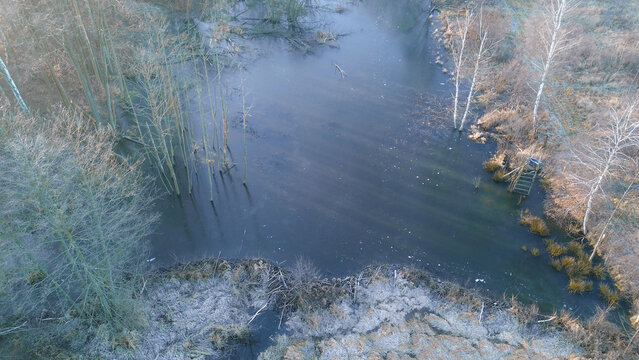 Winter aerial shot of a frozen wetland