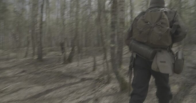 Reenactors Dressed As German Infantry Soldiers Make War Ambush In Autumn Forest. Running For Group Of Soldiers With Carabines Mauser 98k, Sub-machine Gun In Forest. Wermacht Military Uniform. Ungraded