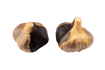 two garlic bulbs with a white background