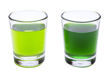 two glasses of green liquid on a white background