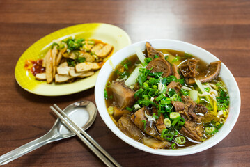 Traditional Taiwanese beef noodle soup with garnish