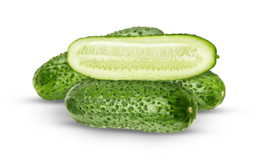fresh green cucumbers, one sliced, on transparent background.