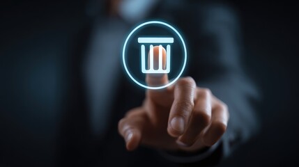 Hand deletes digital data on screen