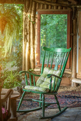 Lonely rocking chair in a sunlit room