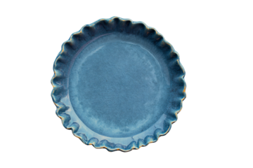 a blue plate with a scallop edge