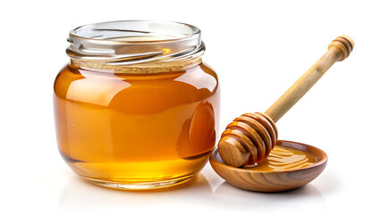 A Glass Jar Of Honey With Dipper Resting Beside It On White