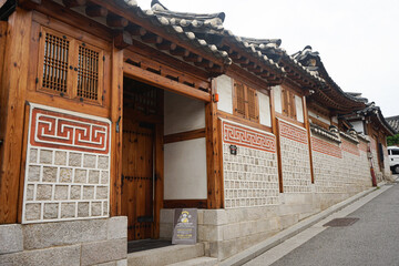 Entryway to a hanok style home in the historic Bukchon Hanok Village neighborhood in Jongno District, Seoul, South Korea