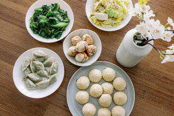 Chinese Style Table Setup Dumplings, Tea Egg, Steam Bun