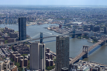 Obraz premium Aerial view of lower Manhattan Island in New York City, New York, on a sunny day