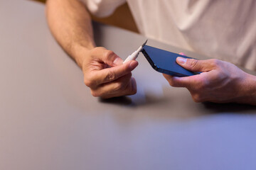 The Innovative Smartphone Cleaning Device is Being Demonstrated During Use and Functionality