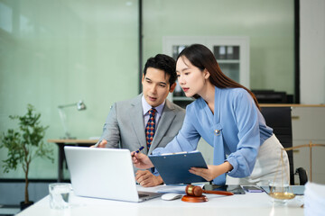 Professional female lawyers consulting on legal cases in office. Perfect for law, business,...