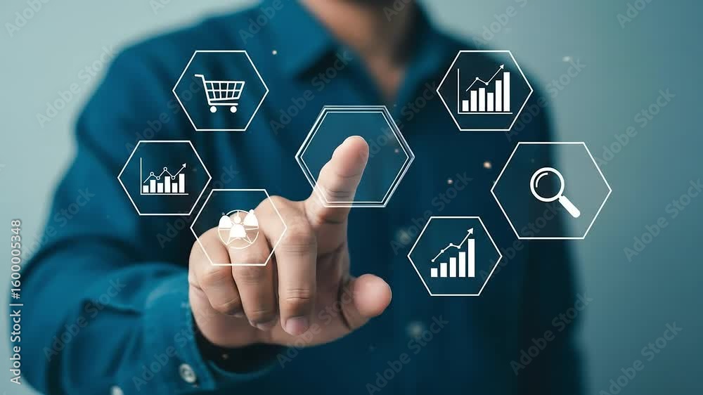 Poster man interacts with a digital interface displaying business and technology icons with bright light.