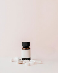 glass bottles and pills on beige background , treatment concept, dietary supplements. mock up. copy space 