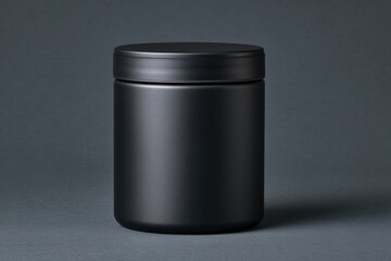Minimalist matte black cylindrical container with screw on lid