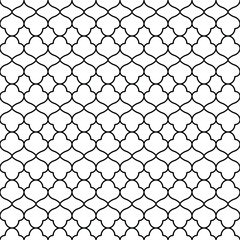 Intricate black and white quatrefoil pattern seamless geometric design