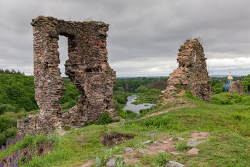 Ruins of medieval Hubkiv Castle on steep hill, Ukraine